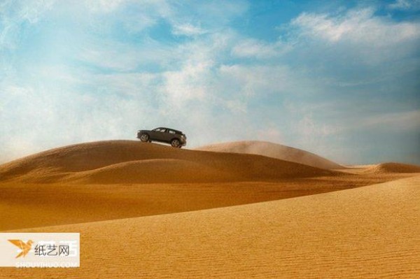 Create a 1:43 car world, an Audi desert advertisement specially produced by a miniature photographer