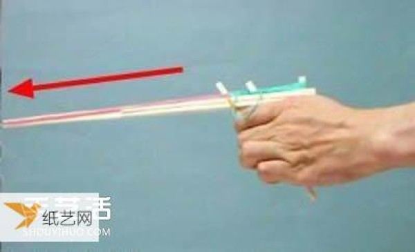 Illustration of how to make your own repeating rubber band gun