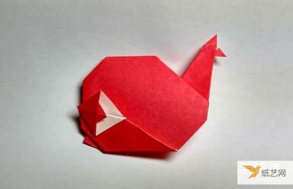 Hand-folded cartoon whale origami step-by-step tutorial