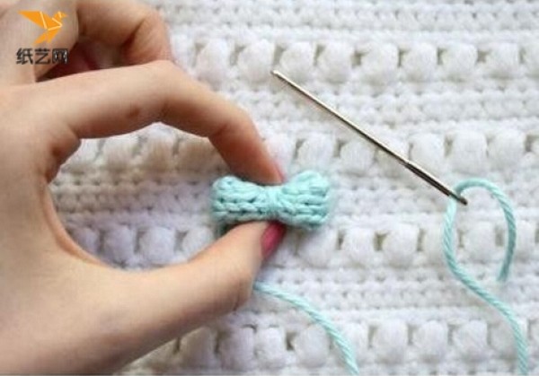 Illustration of hand knitting tutorial for cute bow ring knitting with stick stitches