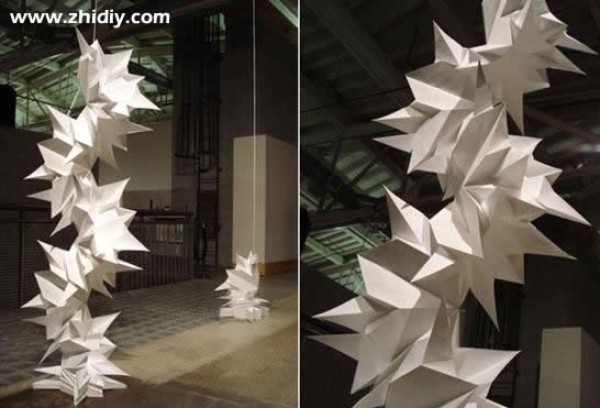 Dynamic paper sculptures by Matt Shlian