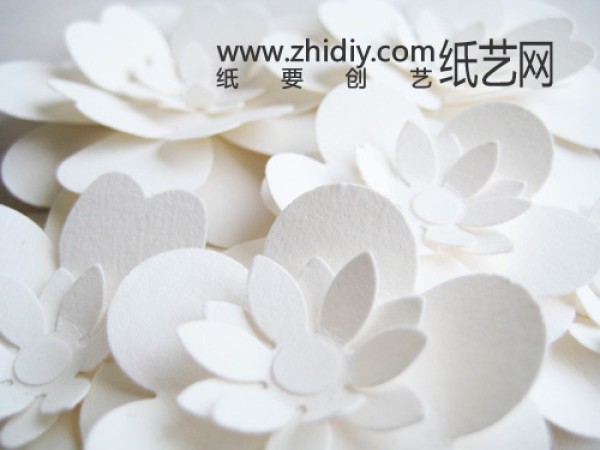 Paper art decoration on wedding cake