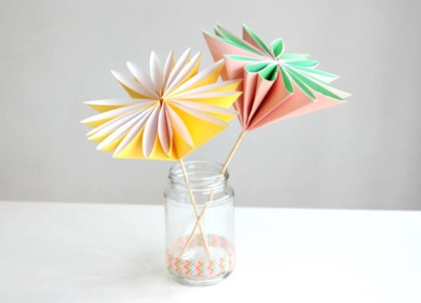 Illustrated tutorial on how to fold simple handmade origami flowers for Childrens Day