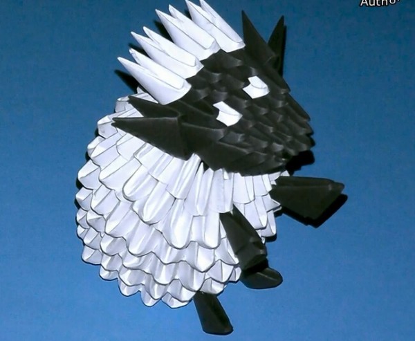 Origami Triangle Encyclopedia teaches you how to make a simple origami triangle sheep