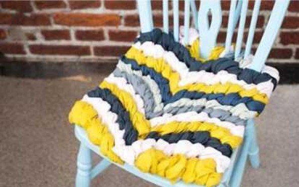 Hand-knitted practical cushions made from waste clothing