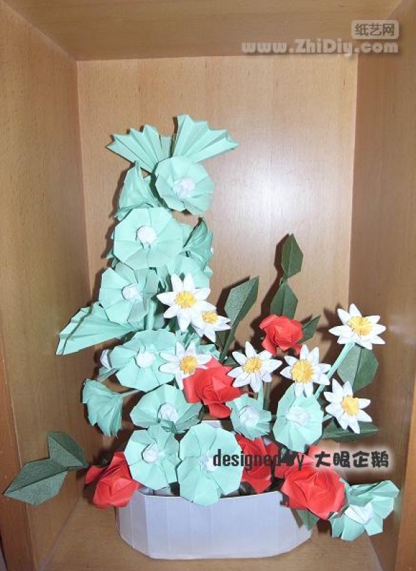 Origami flower bonsai with big-eyed penguin