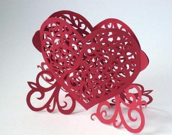 Tutorial on how to make hand-carved paper hearts for Valentine’s Day gifts with actual pictures