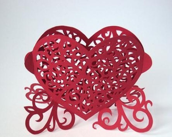 Tutorial on how to make hand-carved paper hearts for Valentine’s Day gifts with actual pictures