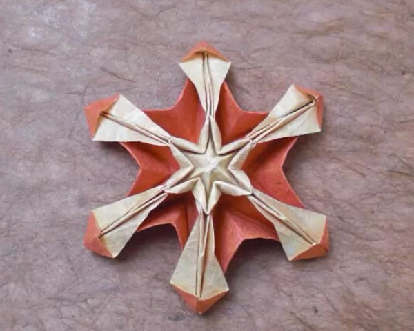 How to fold Christmas three-dimensional handmade origami snowflakes How to make handmade origami snowflakes