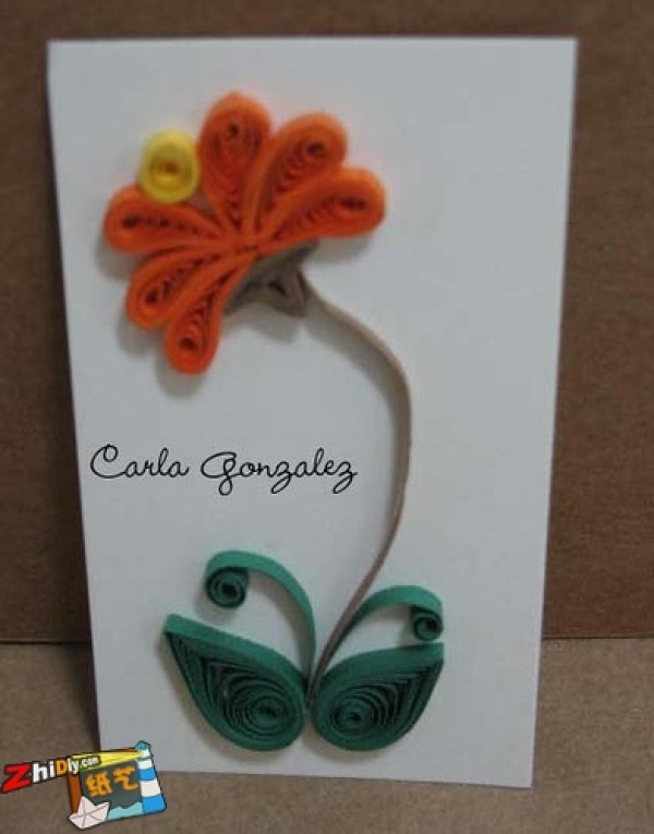 Paper quilling works embellish scrapbooking