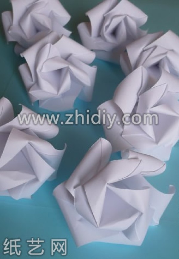 Detailed illustrations of paper flower making tutorial