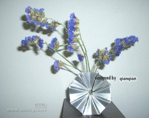 qianqiand magic origami ring turns into vase