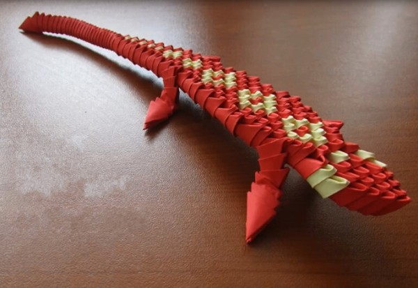 Origami triangle encyclopedia - video tutorial on how to make a triangle lizard