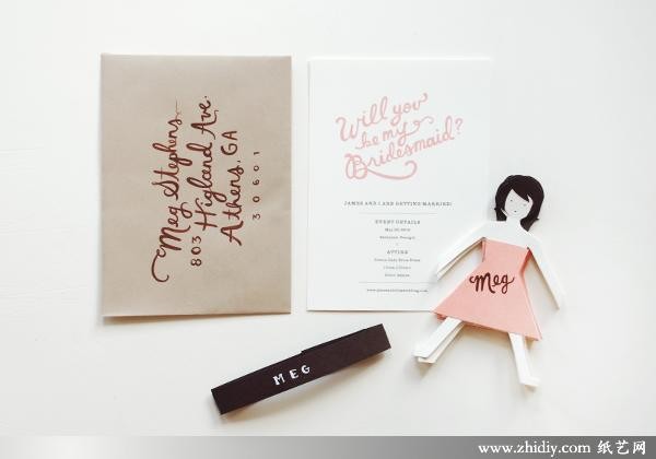 Small paper-cut decorations in invitation cards