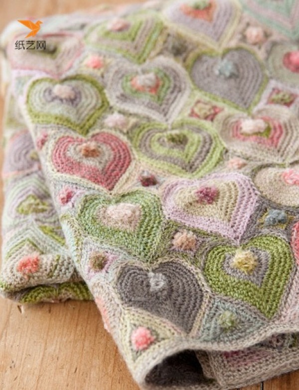 Illustrated tutorial on hand-crocheting a heart-shaped rug using old wool