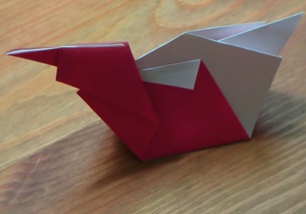 Simple origami tutorial for children to make origami resting little duck