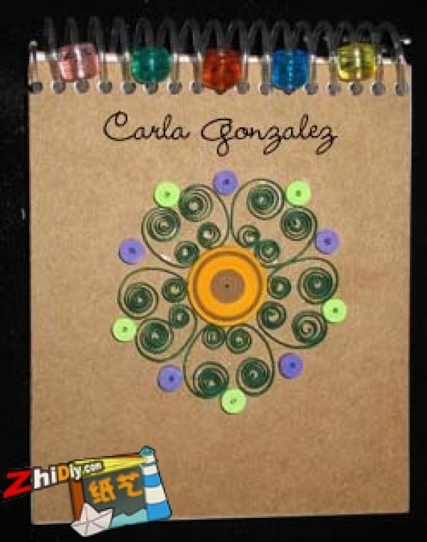 Paper quilling works embellish scrapbooking