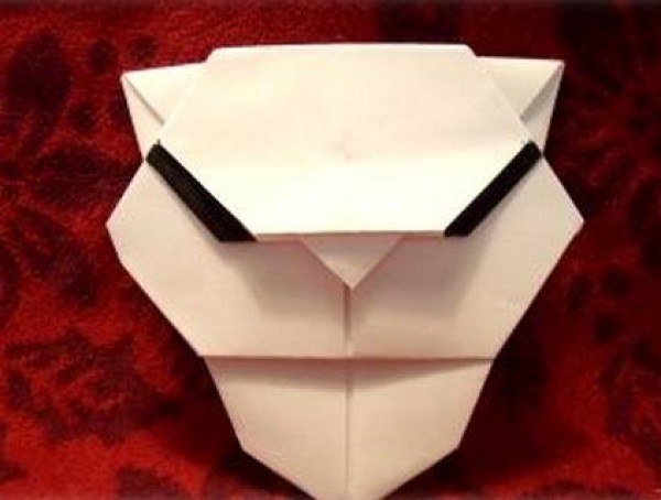 Teach you how to make an origami owl in ten steps. Origami complete illustrated tutorial