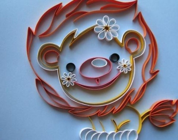 DIY tutorial on how to draw a cartoon lion on quilled paper