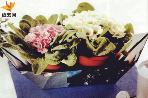 Use waste magazines to make handmade origami and create cute boat-shaped origami flower pots.