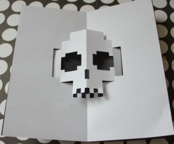 Halloween greeting card handmade tutorial teaches you step by step how to make a Halloween skull three-dimensional card