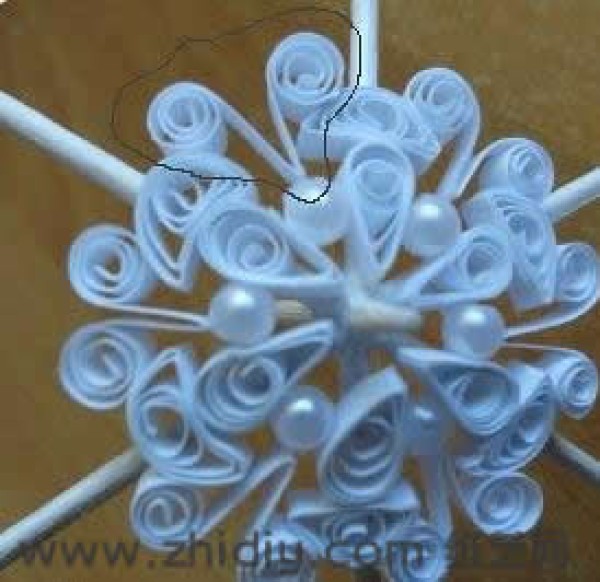 Tutorial on how to make handmade DIY paper quilled umbrellas