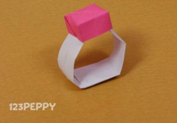 Video tutorial on how to fold a simple origami ring—a complete origami crafting guide for children