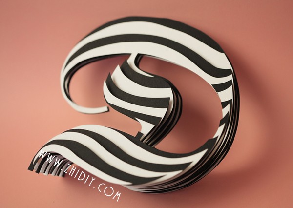 Appreciation of black and white three-dimensional paper carving letters