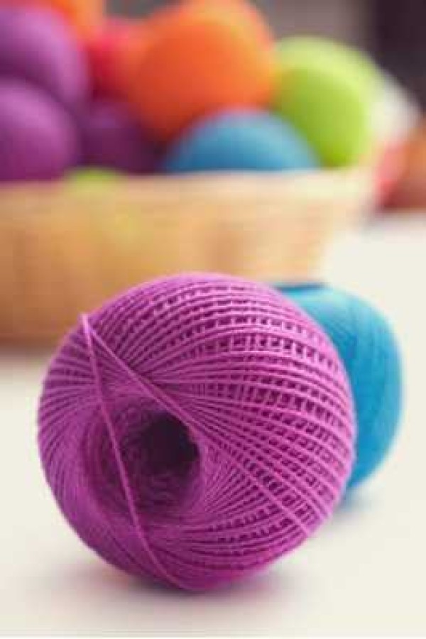 Crochet-detailed tutorial on making yarn ball bouquet