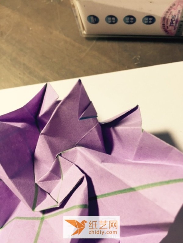 Detailed step-by-step tutorial on making Kawasaki rose origami