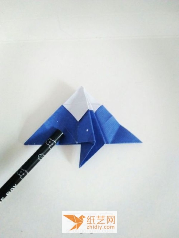 Cute origami volcano making tutorial illustration