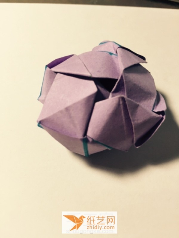 Detailed step-by-step tutorial on making Kawasaki rose origami