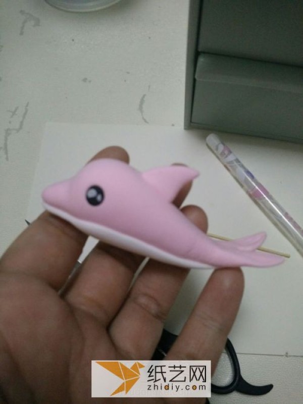 Tutorial on making handmade clay dolphins Cartoon small animals are made from clay