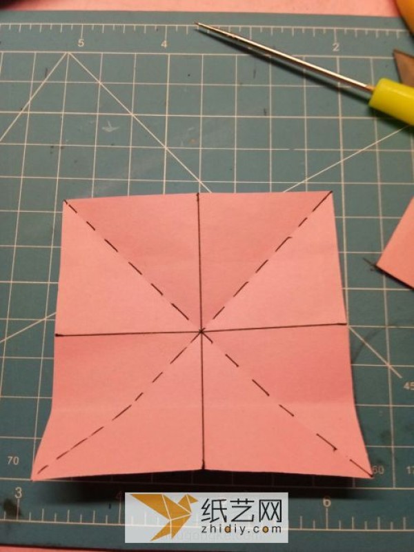 Simple origami flowers are the icing on the cake for Teacher’s Day gifts