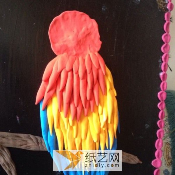 Illustrated tutorial on hand-painting a Macaw made from ultra-light clay as a Teachers Day gift