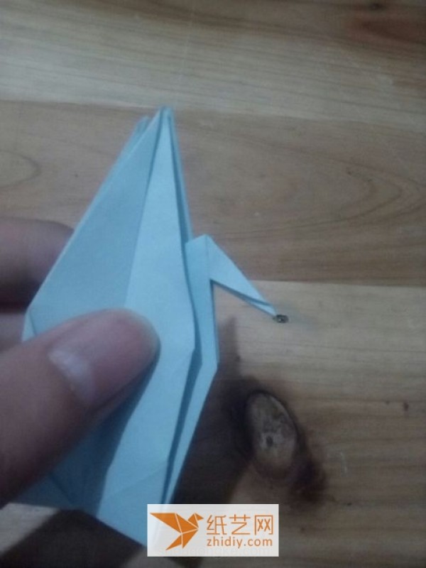 Innovative tutorial on how to make a flying origami crane