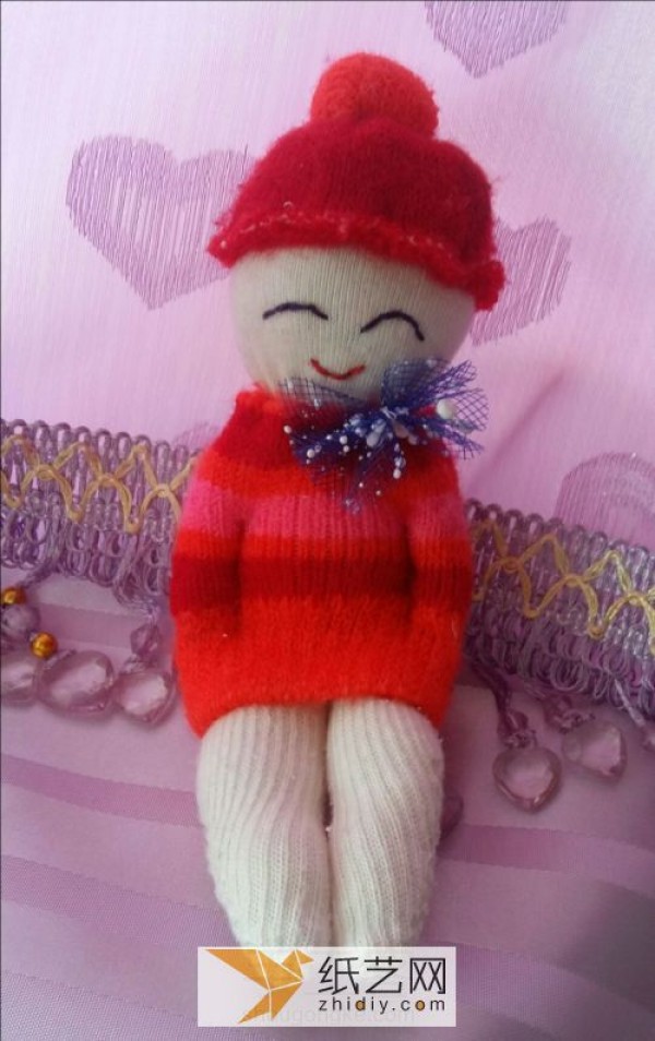 Childrens handmade old items are transformed into sock dolls