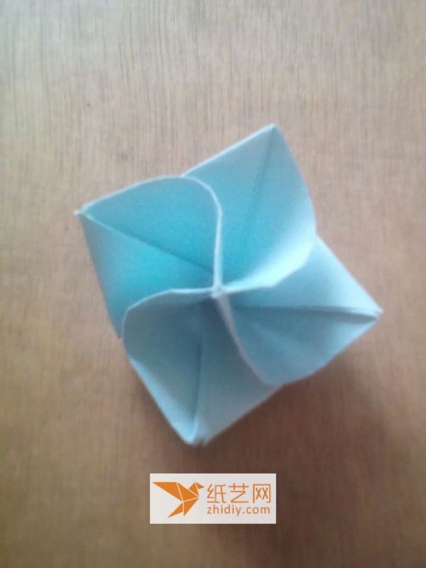 How to fold a simple four-petal origami rose