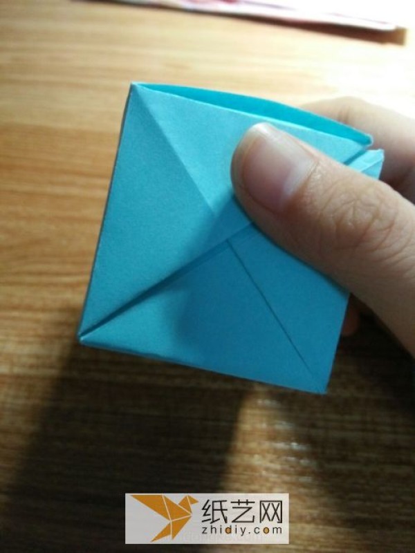 An educational three-dimensional square origami