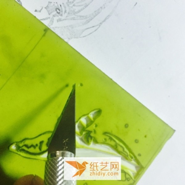 Tutorial on how to carve a whale out of a rubber stamp