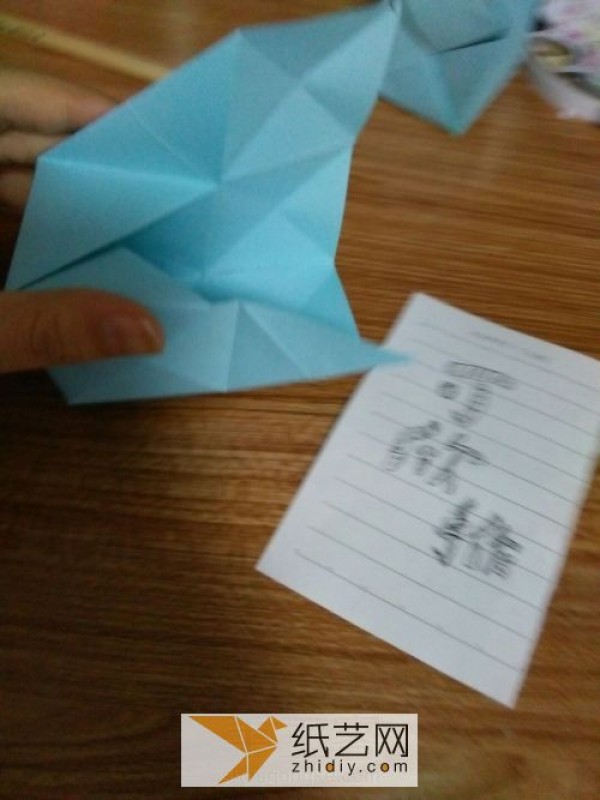 An educational three-dimensional square origami