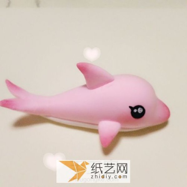 Tutorial on making handmade clay dolphins Cartoon small animals are made from clay