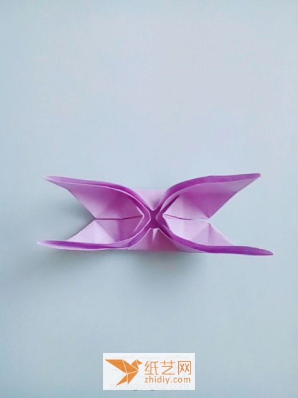 Origami swallowtail butterflies add the finishing touch to Christmas and New Year decorations