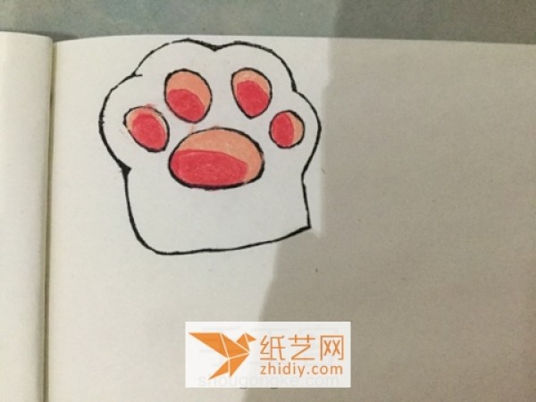 Beginners tutorial on making puppy paws with colored rubber stamps