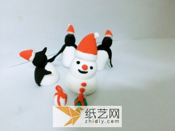 Illustrated handmade tutorial for making Christmas clay penguins and clay gifts