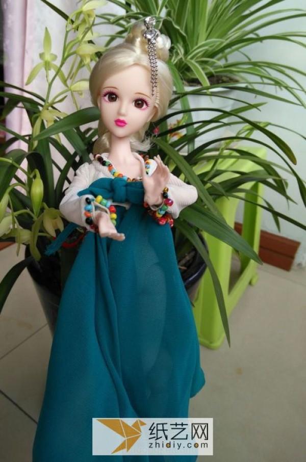 In the New Year, the doll will be given a Korean dress made of handmade fabrics.