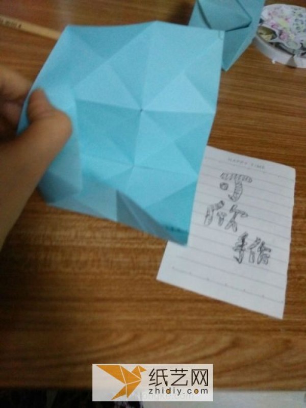 An educational three-dimensional square origami