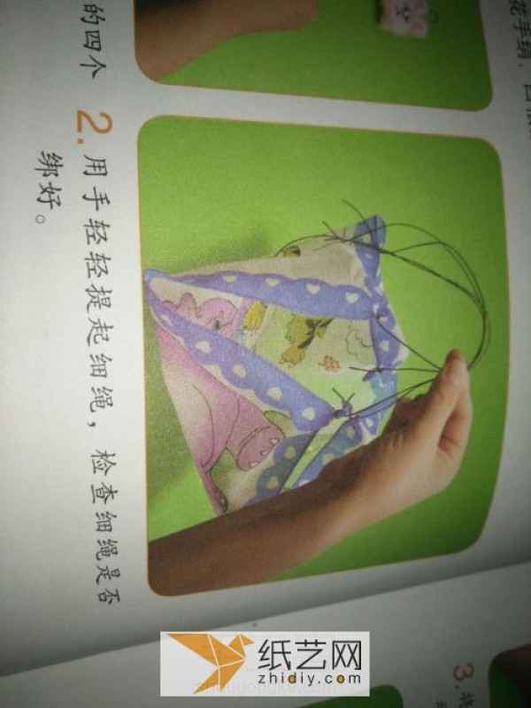 Childrens craft making a parachute out of handkerchief