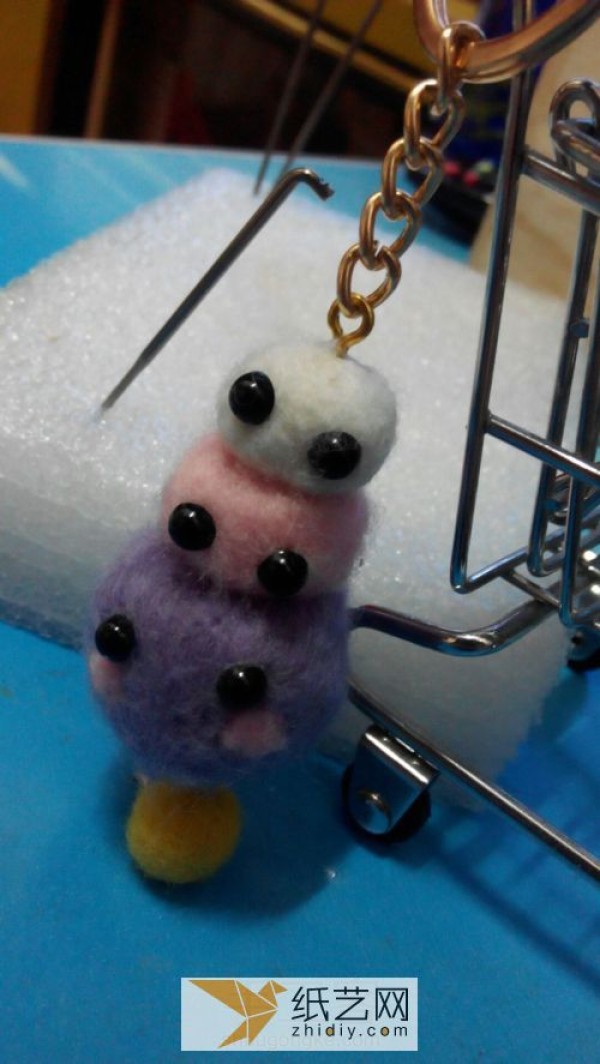 Make a DIY key chain. Wool felt stacked high key chains are great.