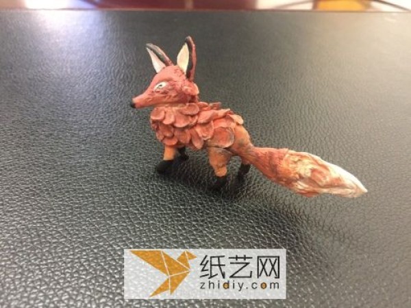 Cute little fox made of ultra-light clay